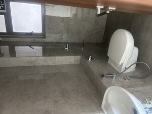 Bathroom in 2 BHK Apartment at Sheth Auris Bliss, Malad West – for Rent