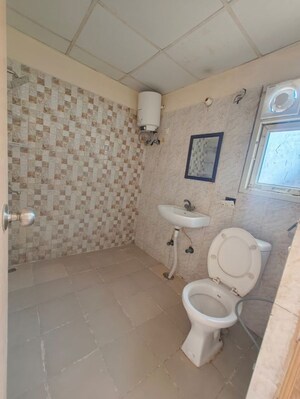 Bathroom in 3 BHK Apartment at Antriksh Golf View, Sector 78 – for Rent