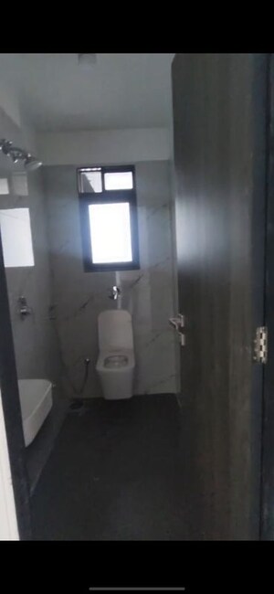 Bathroom in 2 BHK Apartment at Dev Leo Tower, Oshiwara – for Rent