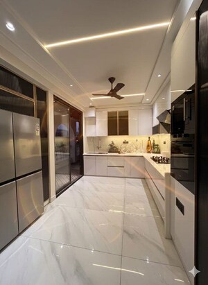 Kitchen in 4 BHK Apartment at Manglam 14 Woodland Park, Shiprapath – for Rent