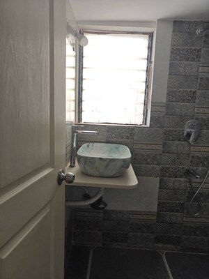 Bathroom in 2 BHK Apartment at Kishor Sukur Enclave A, Ghodbunder Road – for Sale