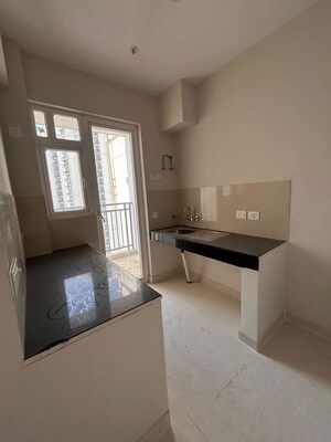 Kitchen in 2 BHK Apartment at Eldeco Live By The Greens, Sector 150 – for Rent