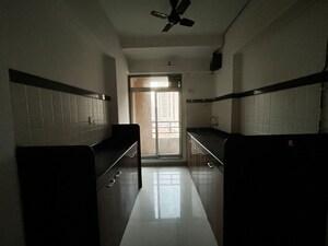 Kitchen in 2 BHK Apartment at Cosmos 27 Gbr, Kasarvadavali – for Sale