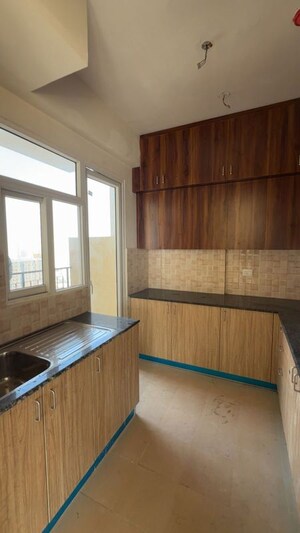 Kitchen in 3 BHK Apartment at Amrapali Crystal Homes, Sector 76 – for Rent