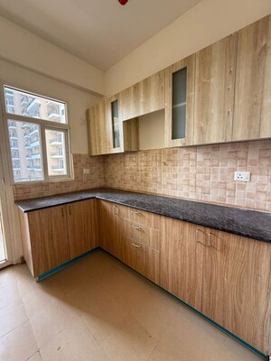 Kitchen in 3.5 BHK Apartment at Amrapali Crystal Homes, Sector 76 – for Rent