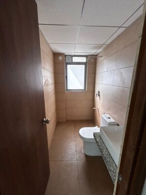 Bathroom in 2 BHK Apartment at Sudarshan Sky Garden, Ghodbunder Road – for Sale