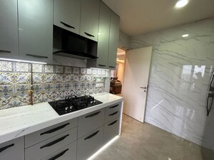 Kitchen in 2 BHK Apartment at Metropolis Rivera, Kasarvadavali – for Sale