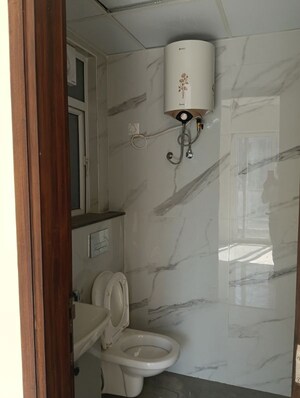 Bathroom in 3.5 BHK Builder Floor at Smart World Gems, Sector 89 – for Rent