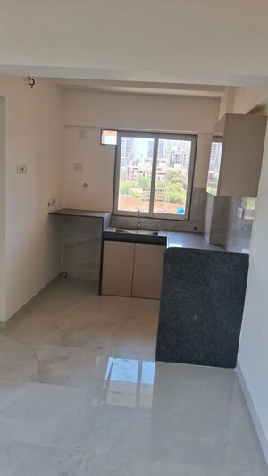 Kitchen in 2 BHK Apartment at Raunak Unnathi Woods, Ghodbunder Road – for Rent