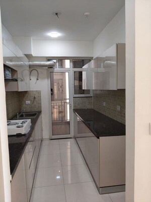Kitchen in 2 BHK Apartment at Godrej Woods, Sector 43 – for Rent