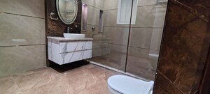 Bathroom in 4 BHK Builder Floor at Mayfield Garden – for Sale