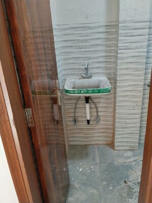 Bathroom in 2 BHK Apartment at Khirki Extension – for Sale
