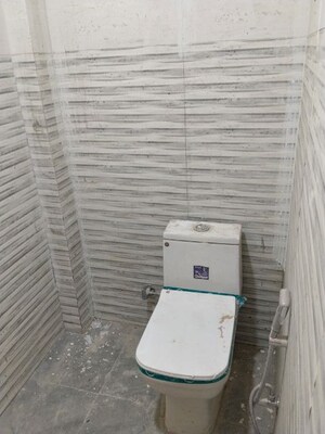 Bathroom in 2 BHK Apartment at Khirki Extension – for Sale