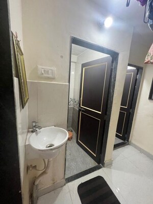 Bathroom in 1 BHK Apartment at Jagrut CHS, Gokhalenagar – for Rent