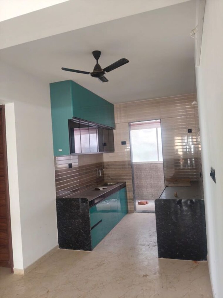 Kitchen, regency-astra 2 Bedroom 1050 Sq.Ft. Apartment In Baner Pune 10276425