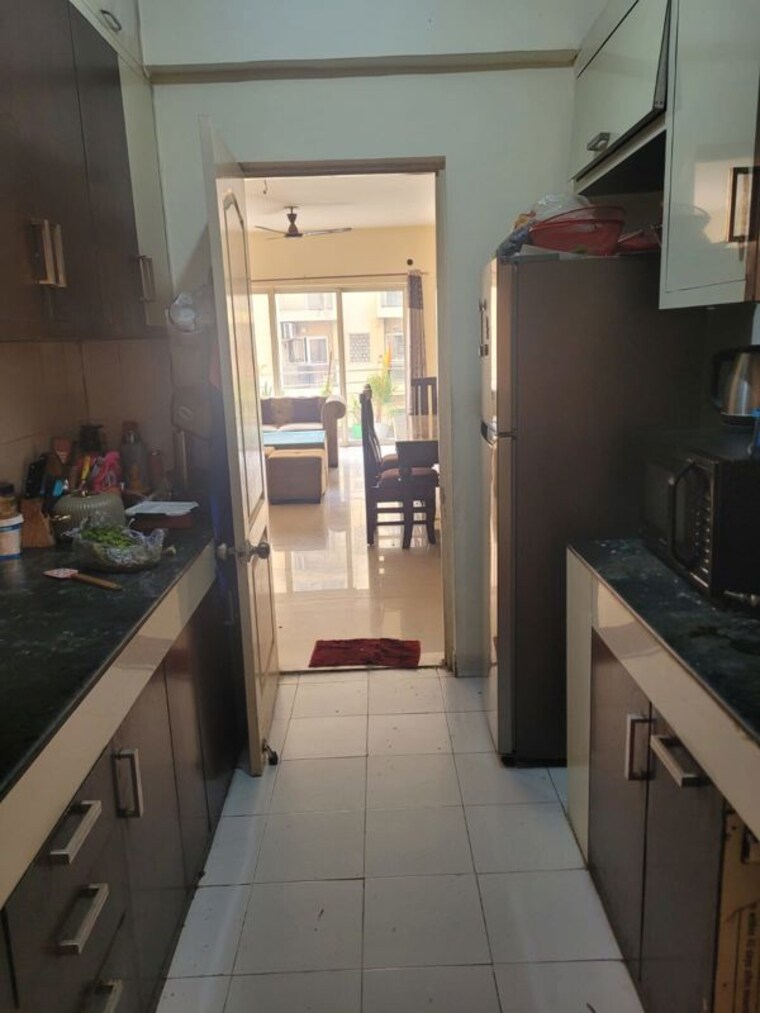 Kitchen, paras-tierea 2 Bedroom 1045 Sq.Ft. Apartment In Sector 137 Noida 10276431