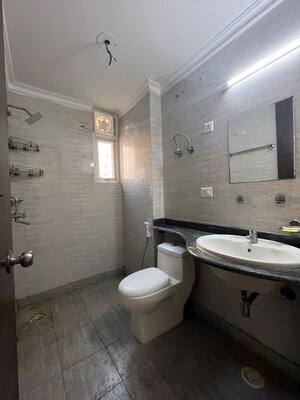 Bathroom in 4 BHK Apartment at Amrapali Heartbeat City, Sector 107 – for Rent