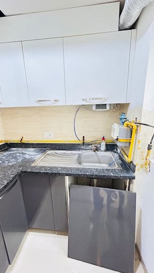 Kitchen in 2 BHK Apartment at Jaypee Green Garden Isles II, Sector 133 – for Rent