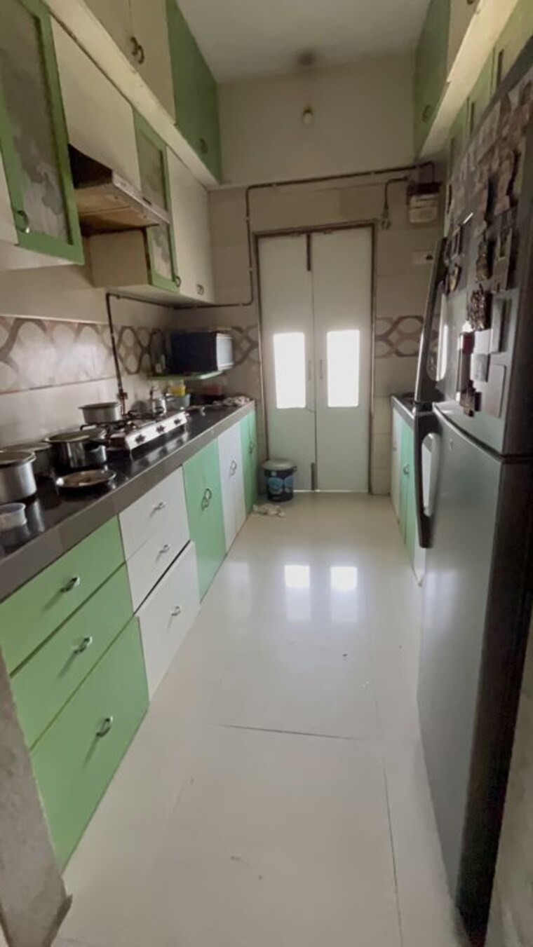 Kitchen, bansi-ratna-chs-goregaon-west 3 Bedroom 900 Sq.Ft. Apartment In Goregaon West Mumbai 10276670