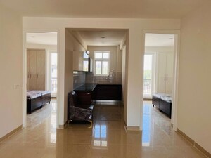 Living Room in 3 BHK Apartment at Maxxus Elanza, International Airport Road – for Rent