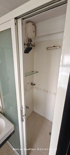 Bathroom in 2 BHK Apartment at Silver View Apartments, Versova – for Rent
