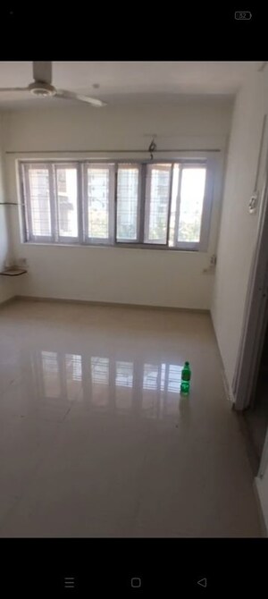 Room in 2 BHK Apartment at Brighton Tower, Andheri West – for Rent