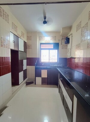 Kitchen in 2 BHK Apartment at Vardhman Gardens, Balkum Pada – for Rent