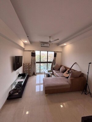 Living Room in 2 BHK Apartment at Earth Building, Matunga East – for Rent