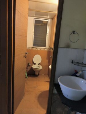 Bathroom in 3 BHK Apartment at Harasiddh Riddhi Tower, Malad East – for Rent