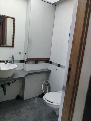 Bathroom in 3 BHK Apartment at Harasiddh Riddhi Tower, Malad East – for Rent
