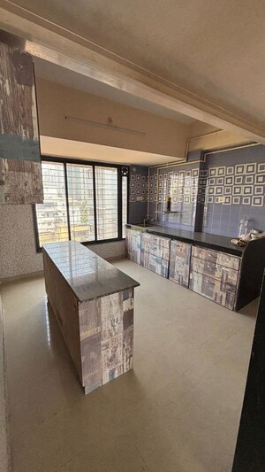 Kitchen in 2 BHK Apartment at Willingdon Heights, Tardeo – for Sale