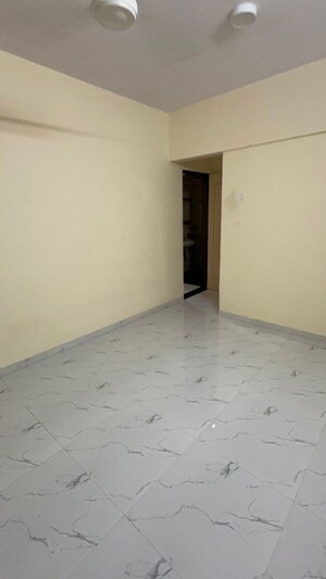 Room in 2 BHK Apartment at Evershine Millennium Paradise, Kandivali East – for Rent