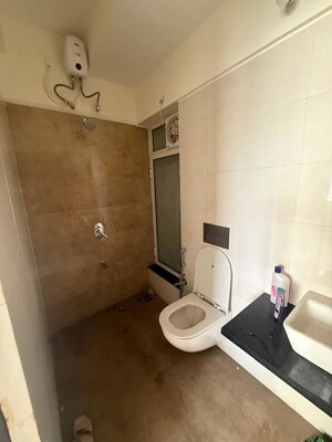 Bathroom in 2 BHK Apartment at Omkar Signet, Malad East – for Rent