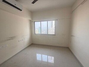 Room in 2 BHK Apartment at Omkar Signet, Malad East – for Rent