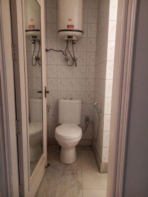 Bathroom in 4 BHK Apartment at Dlf Phase V – for Rent
