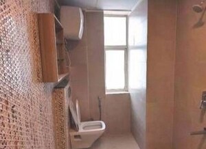 Bathroom in 4 BHK Apartment at Suraj Oranje Castle, Gomti Nagar – for Rent