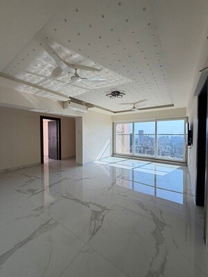 Room in 1 BHK Apartment at Transcon Triumph Tower 2, Andheri West – for Rent