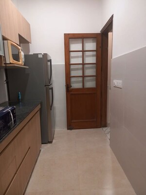 Kitchen in 3 BHK Apartment at Sushant Lok I – for Rent