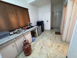 Kitchen in 4 BHK Apartment at Sushant Lok I – for Rent