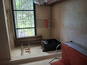 Living Room in 1 BHK Apartment at Uday Rekha Apartment, Andheri West – for Rent
