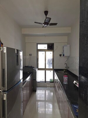 Kitchen in 2 BHK Apartment at Harasiddh Viraaj, Malad East – for Rent
