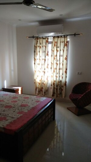 Bedroom in 4 BHK Apartment at Ansal Sushant Apartments, Sushant Lok I – for Rent