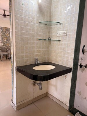 Bathroom in 2 BHK Apartment at Rachana Shilpa, Kothrud – for Rent