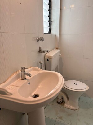 Bathroom in 2 BHK Apartment at Rachana Shilpa, Kothrud – for Rent