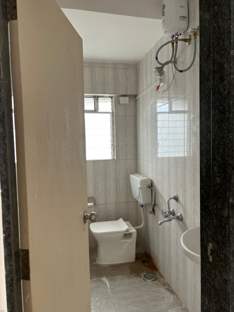 Bathroom, gera-shrishti 1 Bedroom 358 Sq.Ft. Apartment In Wagholi Pune 10277288