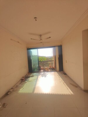 Room in 2 BHK Apartment at Jay Balaji CHS, Nerul Sector 6 – for Rent
