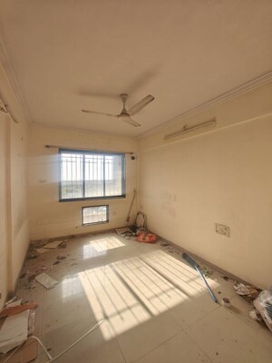 Room in 2 BHK Apartment at Jay Balaji CHS, Nerul Sector 6 – for Rent