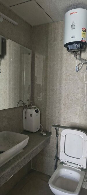 Bathroom in 2 BHK Apartment at Eldeco Live By The Greens, Sector 150 – for Rent