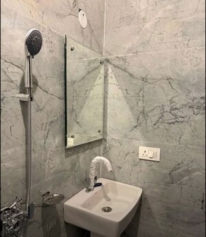 Bathroom in 3 BHK Apartment at Kumar Enclave, Butler Colony – for Rent