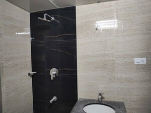 Bathroom in 3 BHK Apartment at Aparna Zenon, Puppalaguda – for Rent